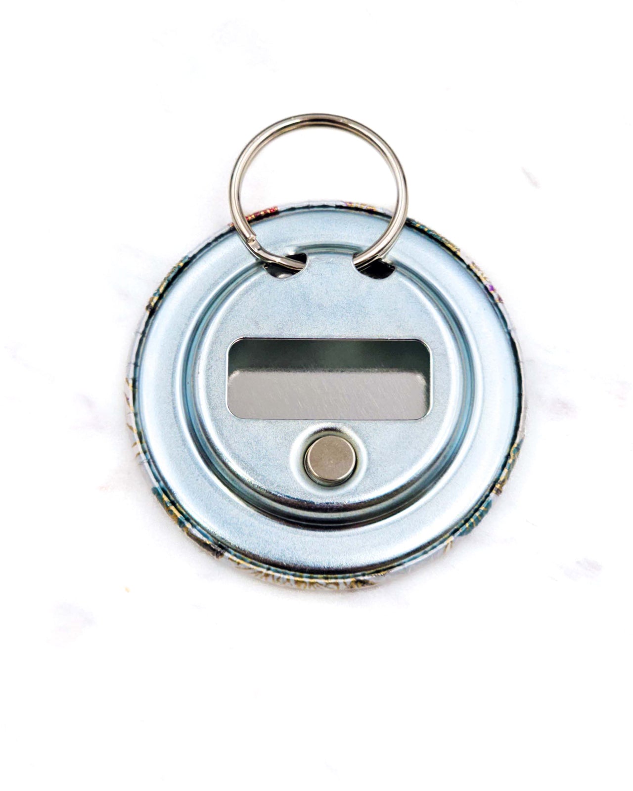 Magnetic bottle opener featuring white cranes and purple wisteria on a light blue background with metallic gold accents.