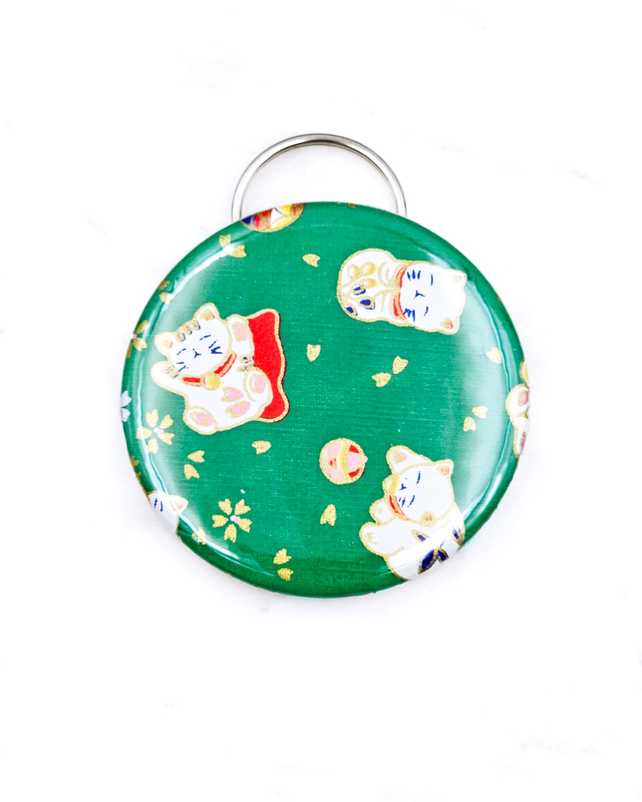 Magnetic bottle opener featuring cute white maneki neko (lucky cats) on a green background with metallic gold accents.
