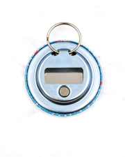 Magnetic bottle opener featuring red fishes and white dots on a blue background with metallic gold accents.