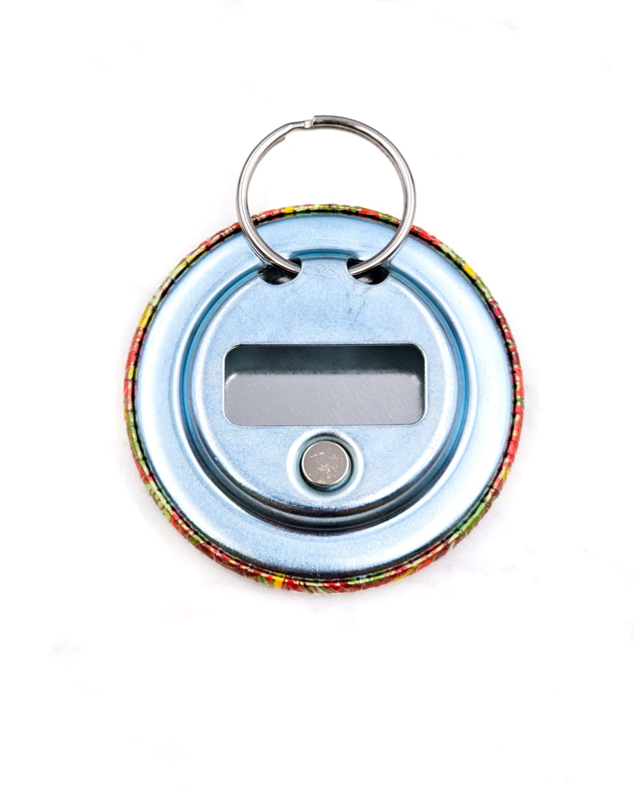 Magnetic bottle opener featuring a green and yellow paisley design on an orange background with metallic gold accents.