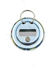 Magnetic bottle opener featuring yellow, blue, and green leaves and persimmons on a green background with metallic gold accents.