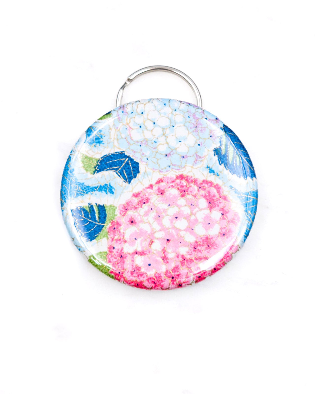 Magnetic bottle opener featuring pink and blue hydrangea flowers on a blue background with metallic gold accents.