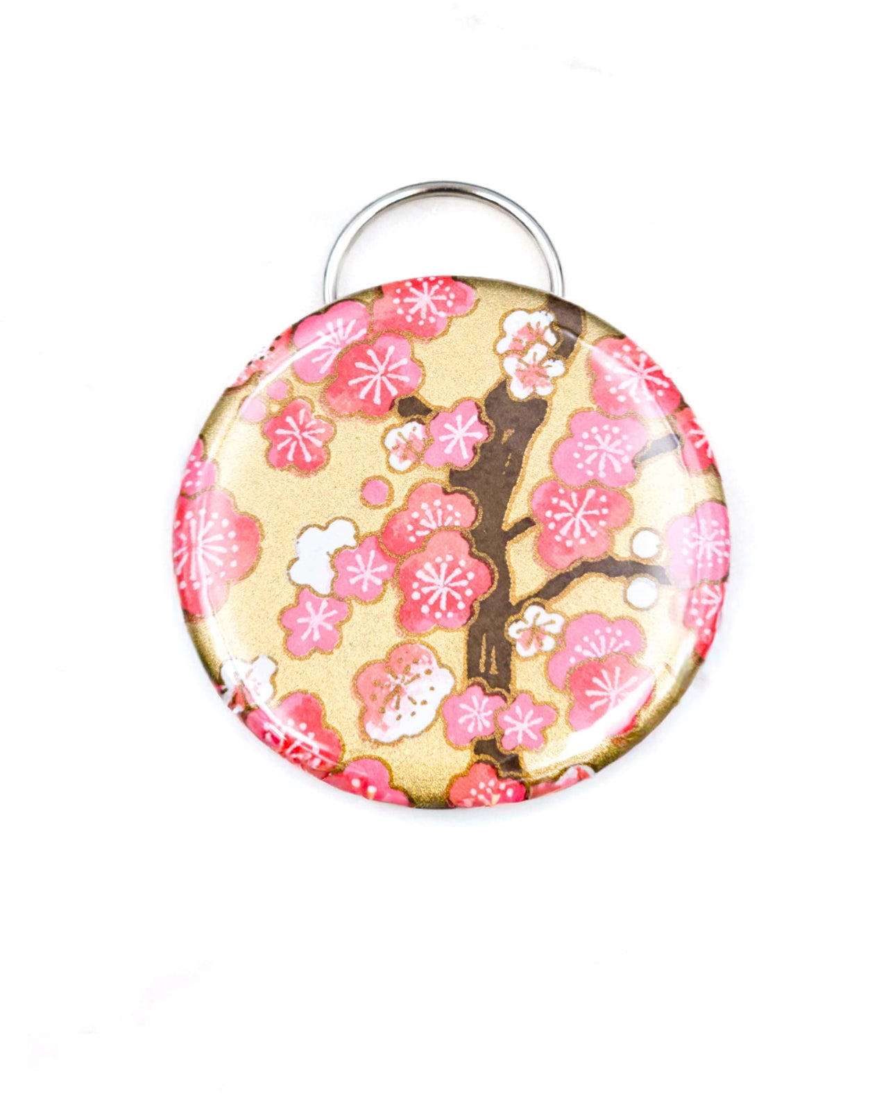 Magnetic bottle opener featuring a pink plum blossom tree on a metallic gold background.
