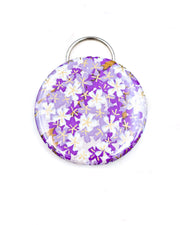 Magnetic bottle opener featuring purple and white cherry blossoms with metallic gold accents.