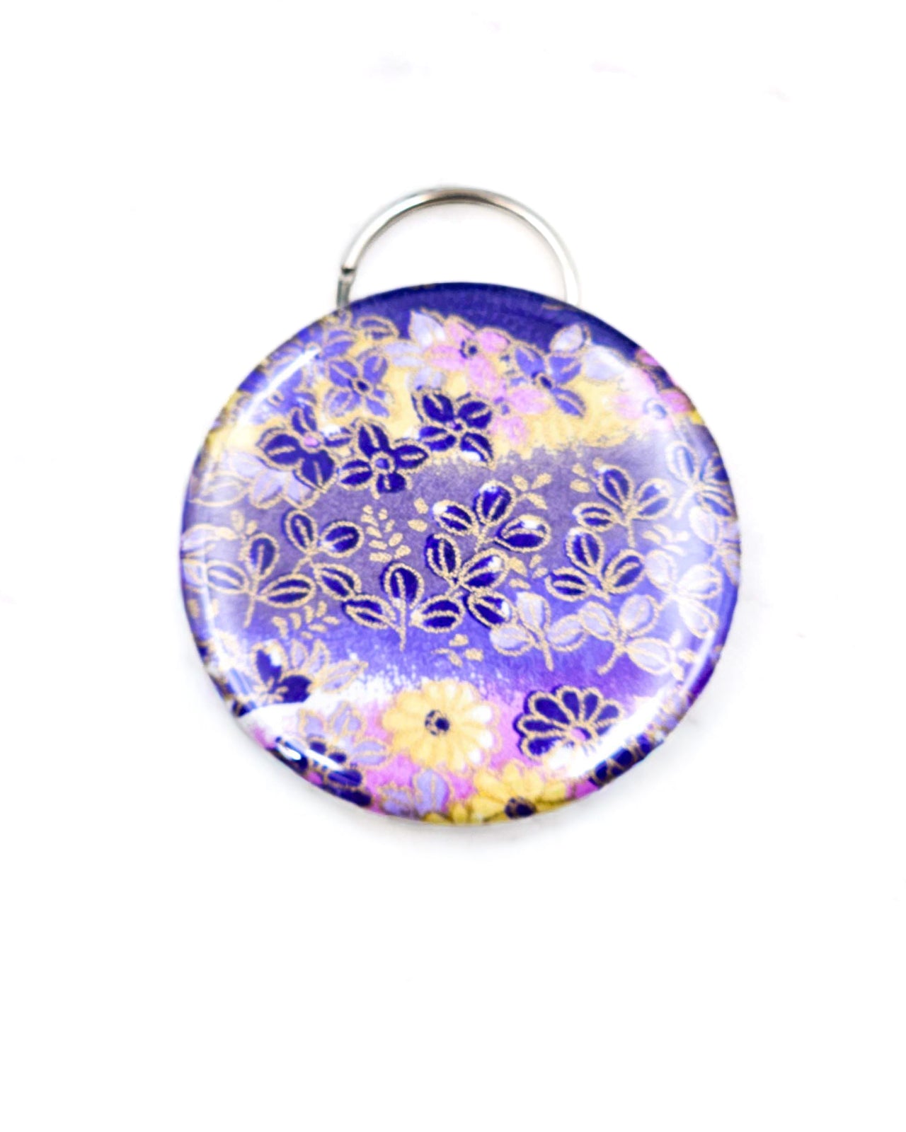 Magnetic bottle opener featuring yellow and purple flowers on a purple background with metallic gold accents.