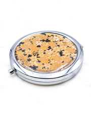 Round silver metal compact mirror featuring small gold and white momiji (maple leaves) on a black background with metallic gold details.