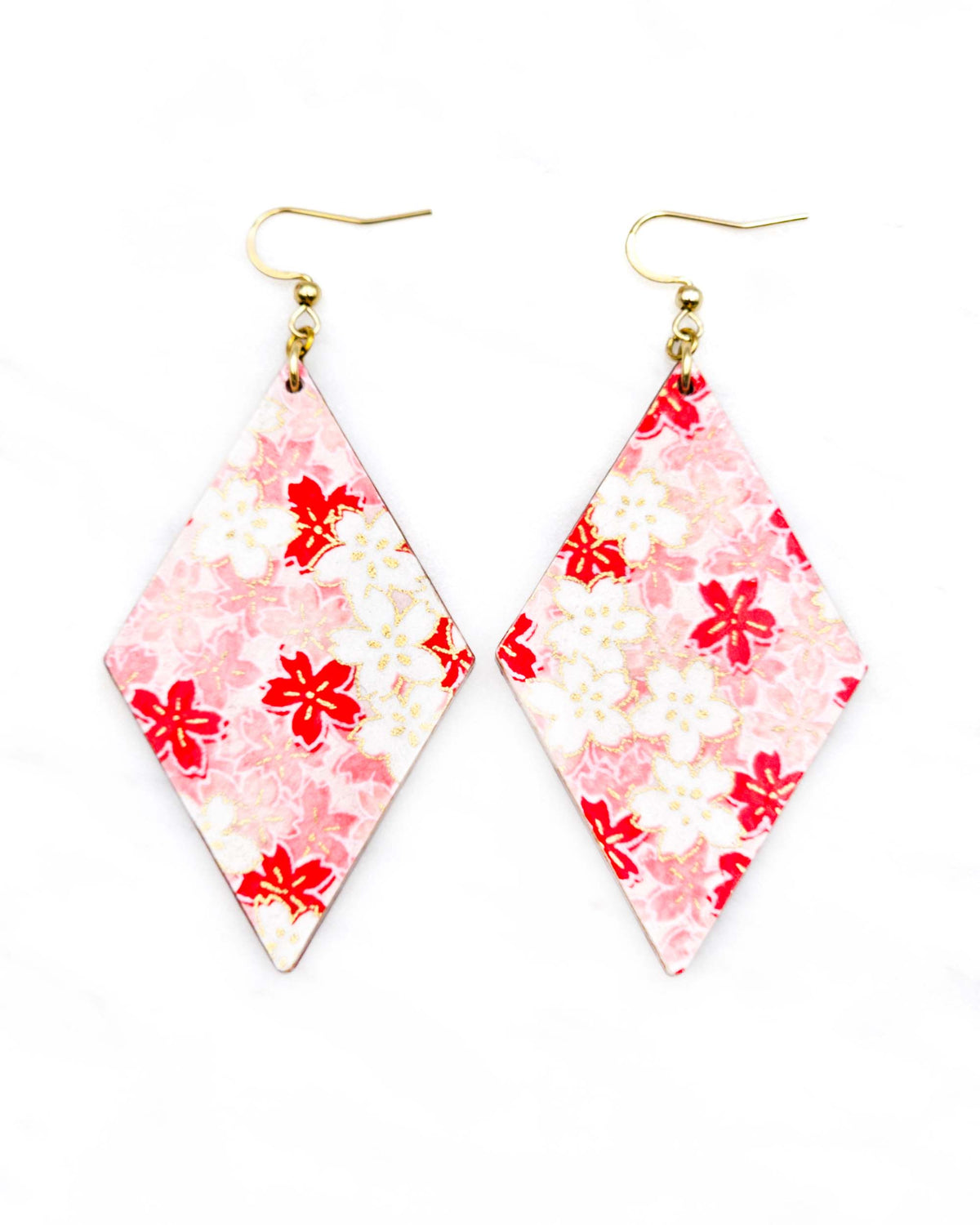 Large wooden diamond shaped earrings featuring pink and white cherry blossoms with metallic gold details