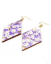 Large wooden diamond shaped earrings featuring purple and white cherry blossoms with metallic gold details