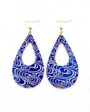 Large wooden hollow teardrop earrings featuring metallic gold water ripples on a dark blue background.