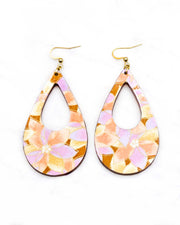Large wooden hollow teardrop earrings featuring orange, brown, and light purple lotuses on a brown background with metallic gold details.
