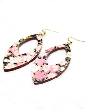 Large wooden hollow pointed oval shaped earrings featuring pink and white cherry blossoms on a black background with metallic gold details.