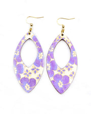 Large wooden hollow pointed oval shaped earrings featuring purple cherry blossoms on a cream background with metallic silver details.