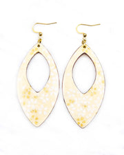 Large wooden hollow pointed oval shaped earrings featuring small white and metallic gold cherry blossoms on pearlescent cream background with metallic silver details.