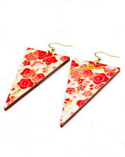 Large wooden long triangle shaped earrings featuring red white plum blossoms with light brown branches on a gray background with metallic gold details.