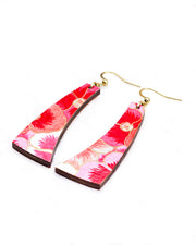 Medium wooden curved bar shaped earrings featuring pink and white pansies with with metallic gold details.