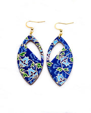 Medium wooden cutout pointed oval shaped earrings featuring blue roses with green leaves on a blue background with metallic gold details