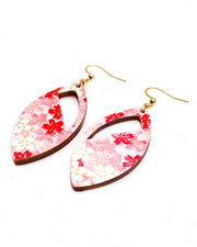 Medium wooden cutout pointed oval shaped earrings featuring pink and white cherry blossoms with metallic gold details