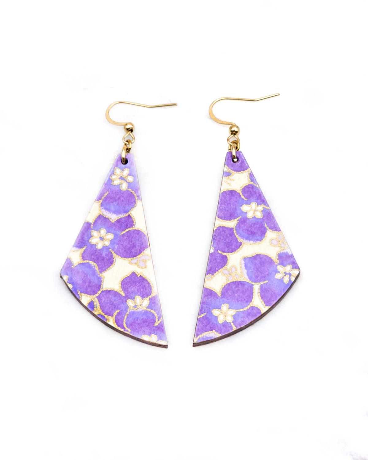 Medium wooden flared drop shaped earrings featuring purple cherry blossoms on a cream background metallic gold details.