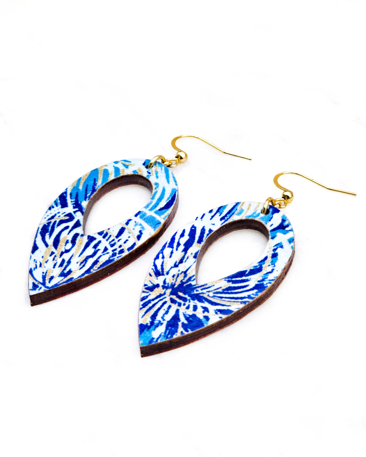 Medium wooden hollow reverse teardrop shaped earrings featuring blue chrysanthemums on a dark blue background with metallic gold details