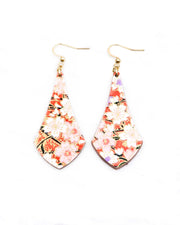 Medium wooden long anchor shaped earrings featuring white and pink cherry blossoms on a reddish orange background with metallic gold details.