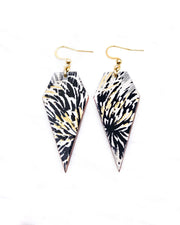 Medium wooden long diamond shaped earrings featuring large black and gray chrysanthemums on a black background with metallic gold details.