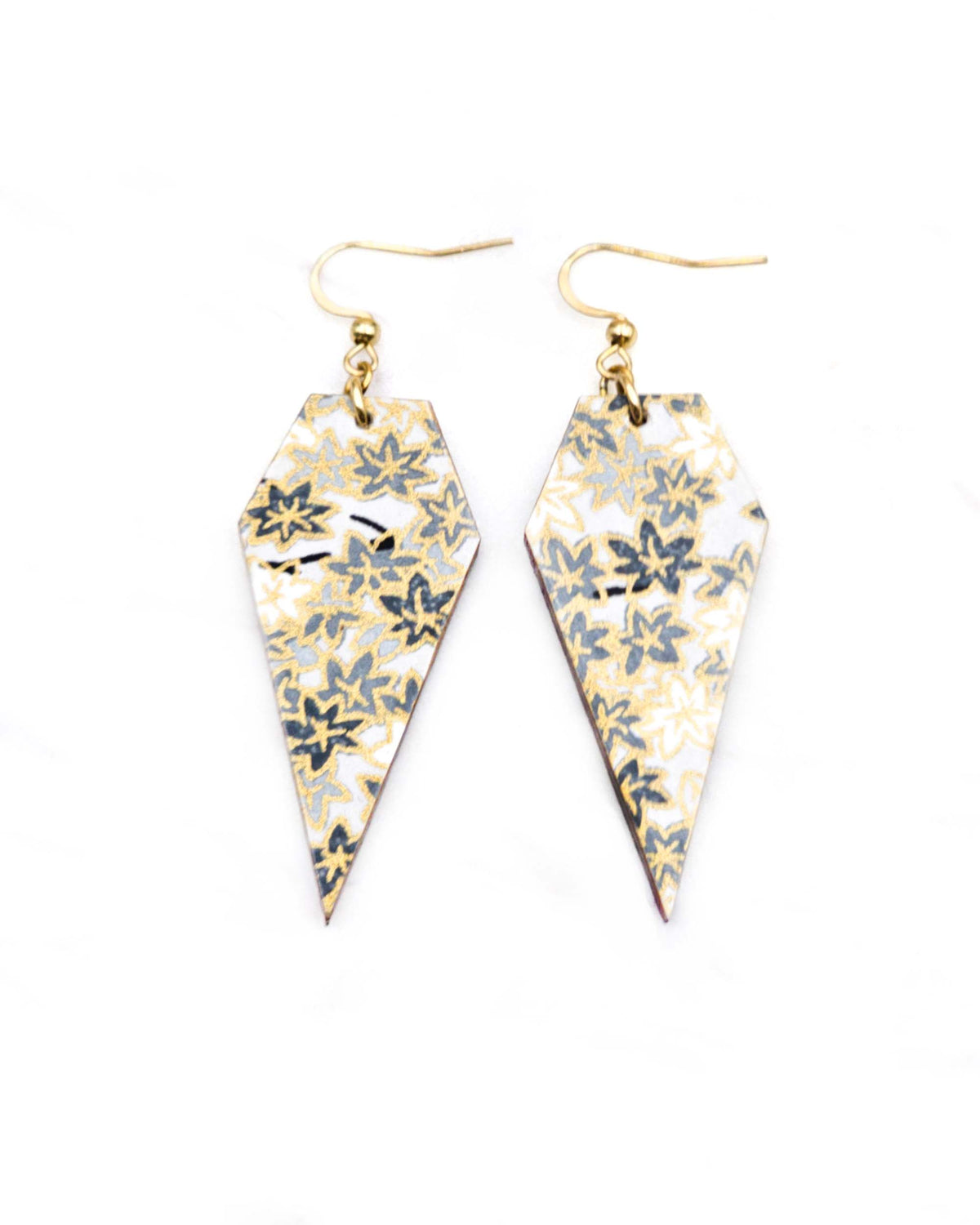 Medium wooden long diamond shaped earrings featuring small gray and white momiji (maple leaves) on a light gray background with metallic gold details.