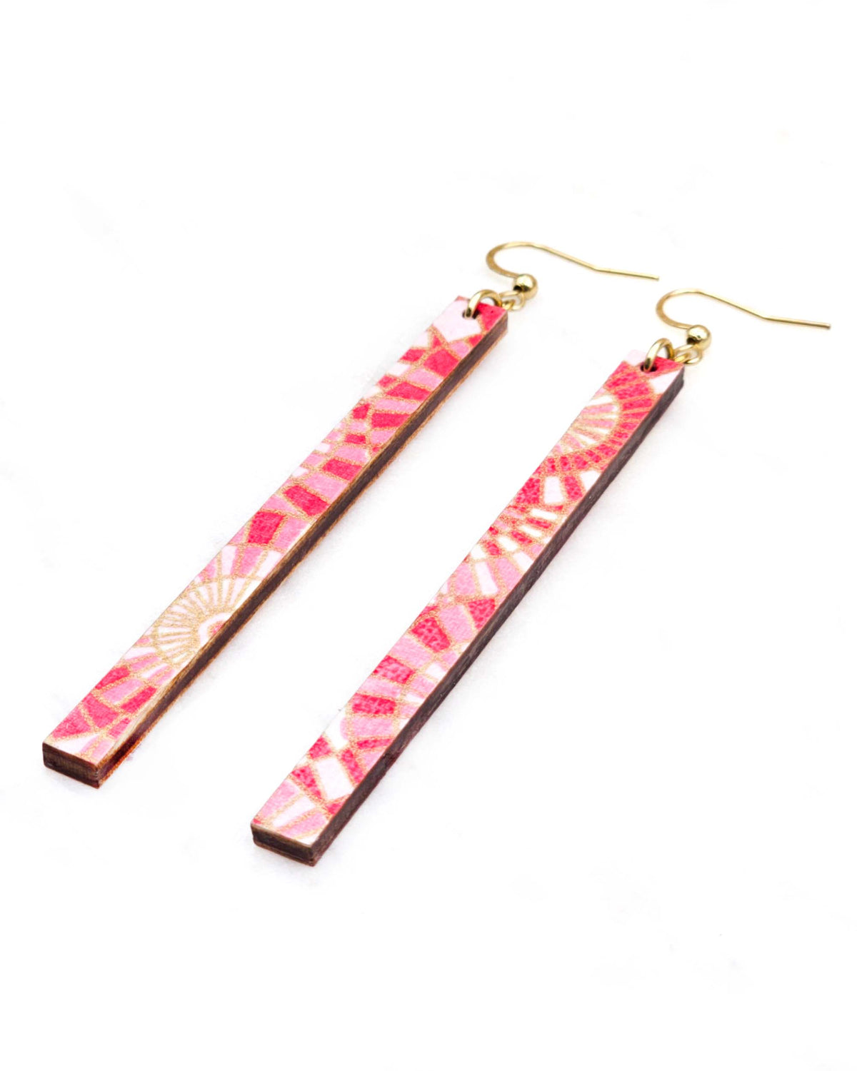 Medium wooden long thin bar shaped earrings featuring pink and white overlapping parasols with metallic gold details.