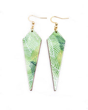 Medium wooden long kite shaped earrings featuring gold, silver, white, and dark green feathery leaves on a green background.