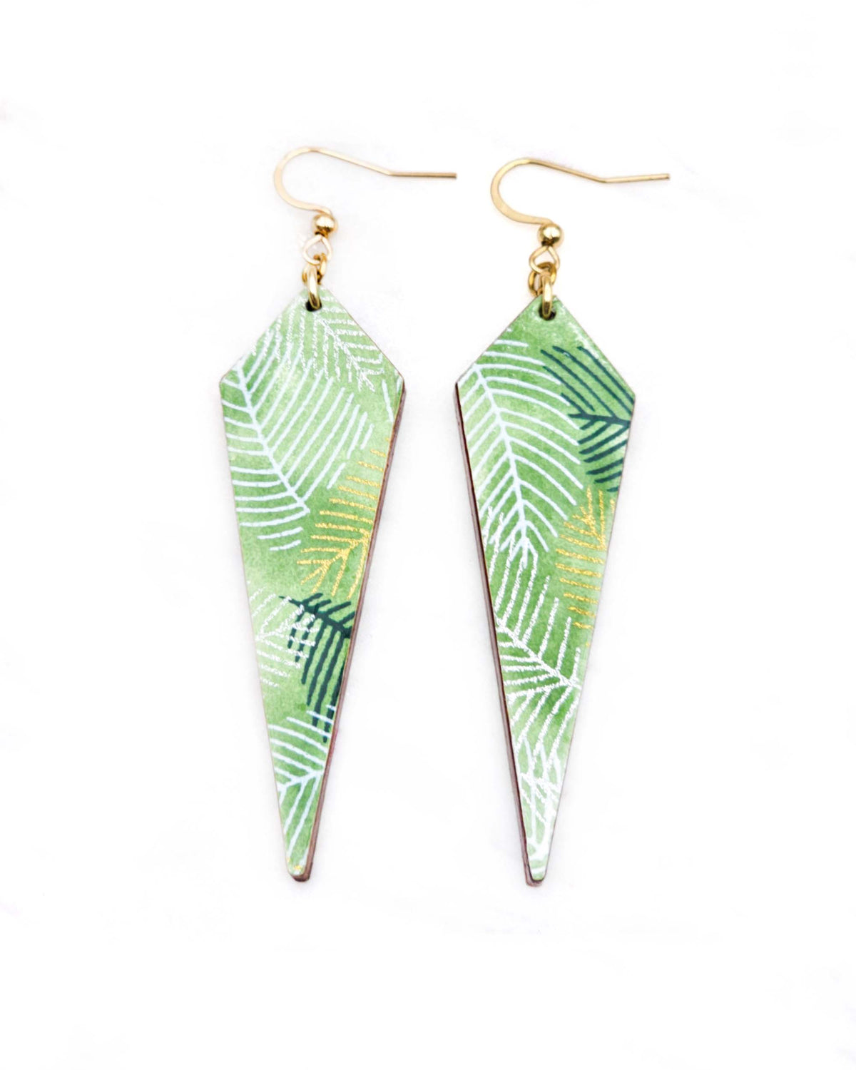 Medium wooden long kite shaped earrings featuring gold, silver, white, and dark green feathery leaves on a green background.