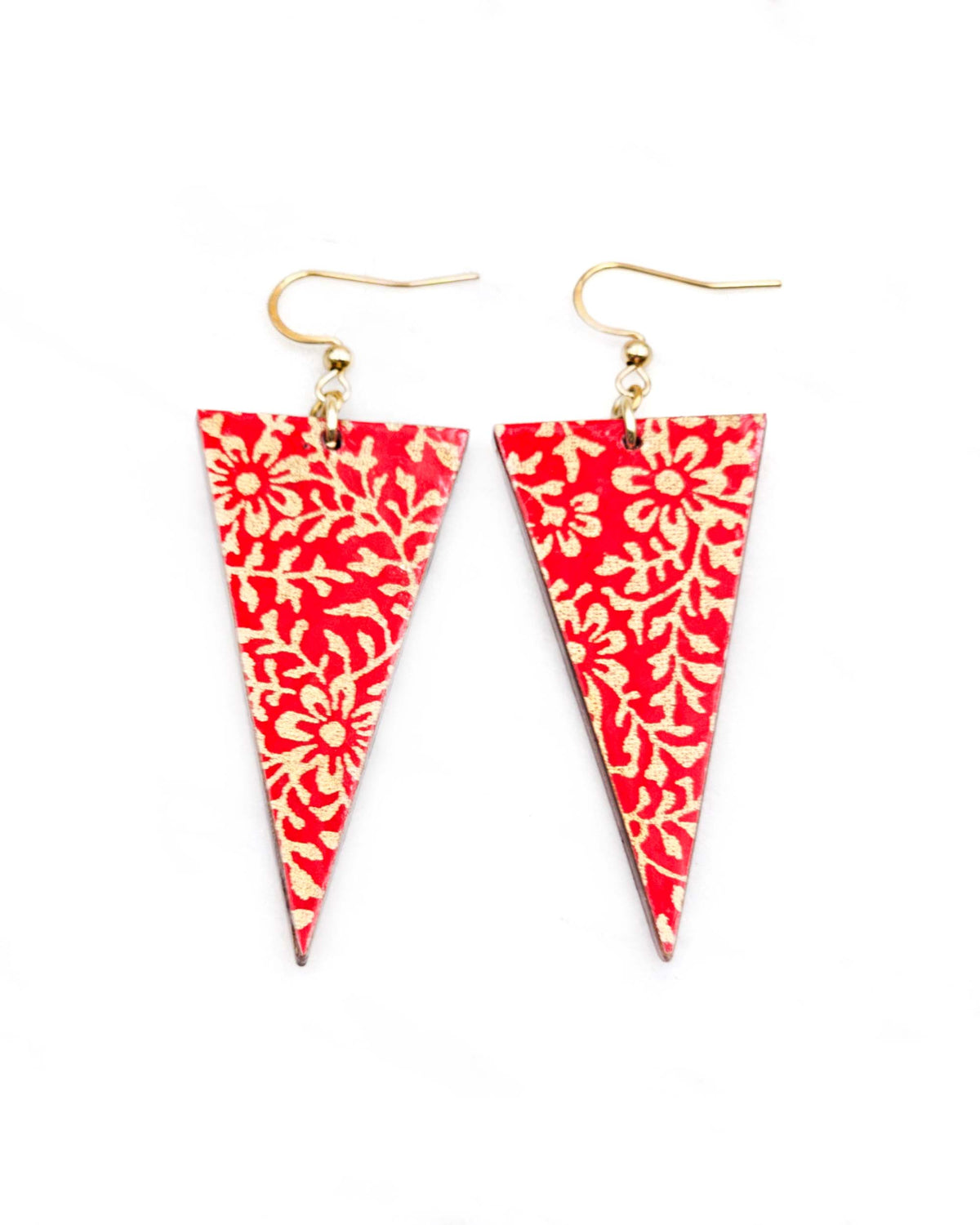 Medium wooden downward triangle shaped earrings featuring a metallic gold floral motif on a bright red background.