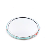 Round pocket mirror featuring red and white koi fishes on a turquoise blue background.