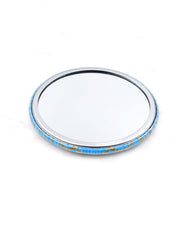 Round pocket mirror featuring a traditional metallic gold and light blue seigaiha (wave crest) design.