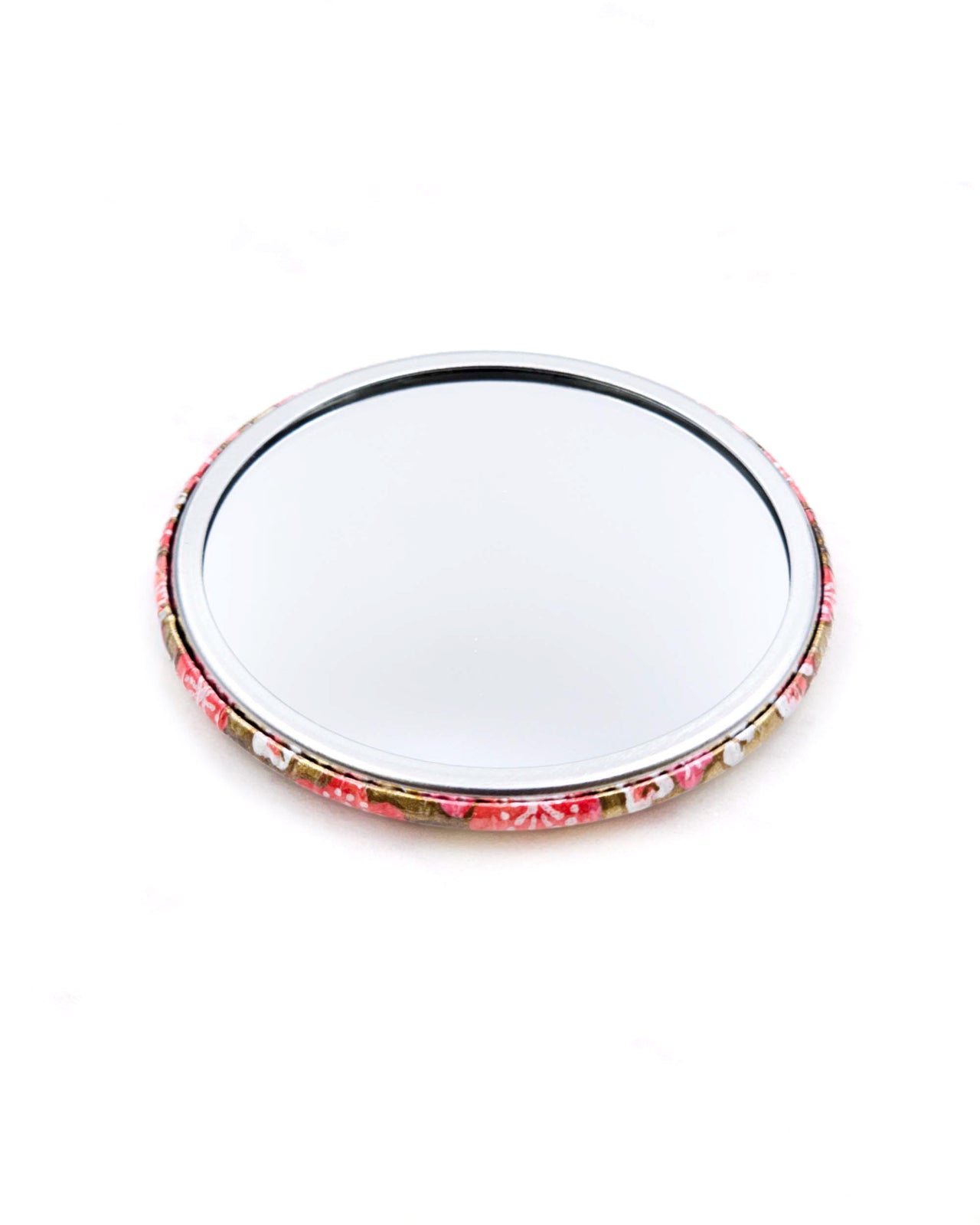 Round pocket mirror featuring pink plum blossoms on a metallic gold background.