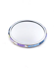 Round pocket mirror featuring purple, blue, and green pansies with metallic gold accents.
