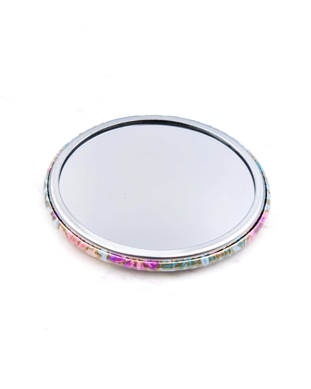 Round pocket mirror featuring yellow flower stalks on a light blue background with metallic gold accents.