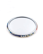 Round pocket mirror featuring red, blue, and white cherry blossoms with metallic gold accents.