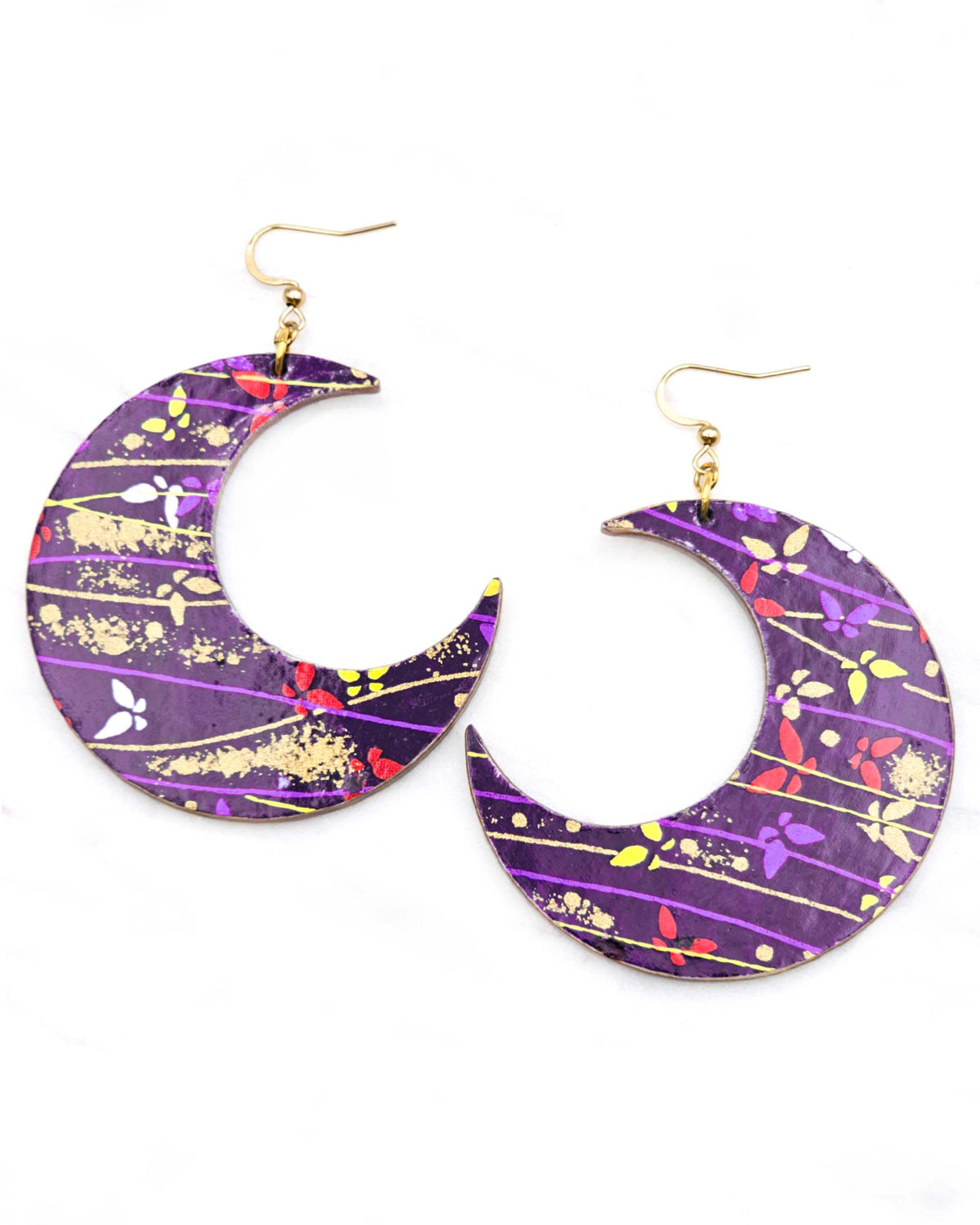 X-Large wooden Crescent Moon shaped earrings featuring colorful butterflies with purple, yellow, and gold lines on a dark purple background with metallic gold details.