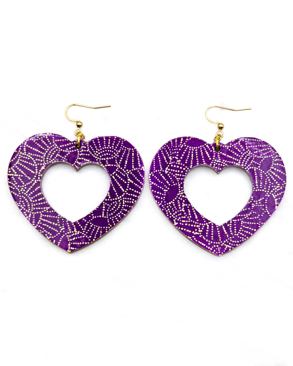 X-Large wooden hollow heart shaped earrings featuring metallic gold pointillistic temari balls on a dark purple background.