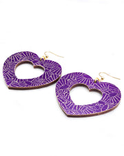 X-Large wooden hollow heart shaped earrings featuring metallic gold pointillistic temari balls on a dark purple background.