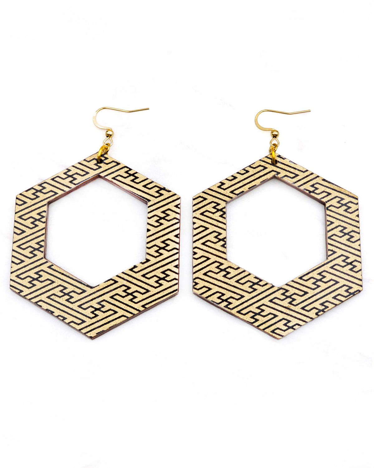 X-Large wooden hollow hexagon shaped earrings featuring a black sayagata design on a metallic gold background.