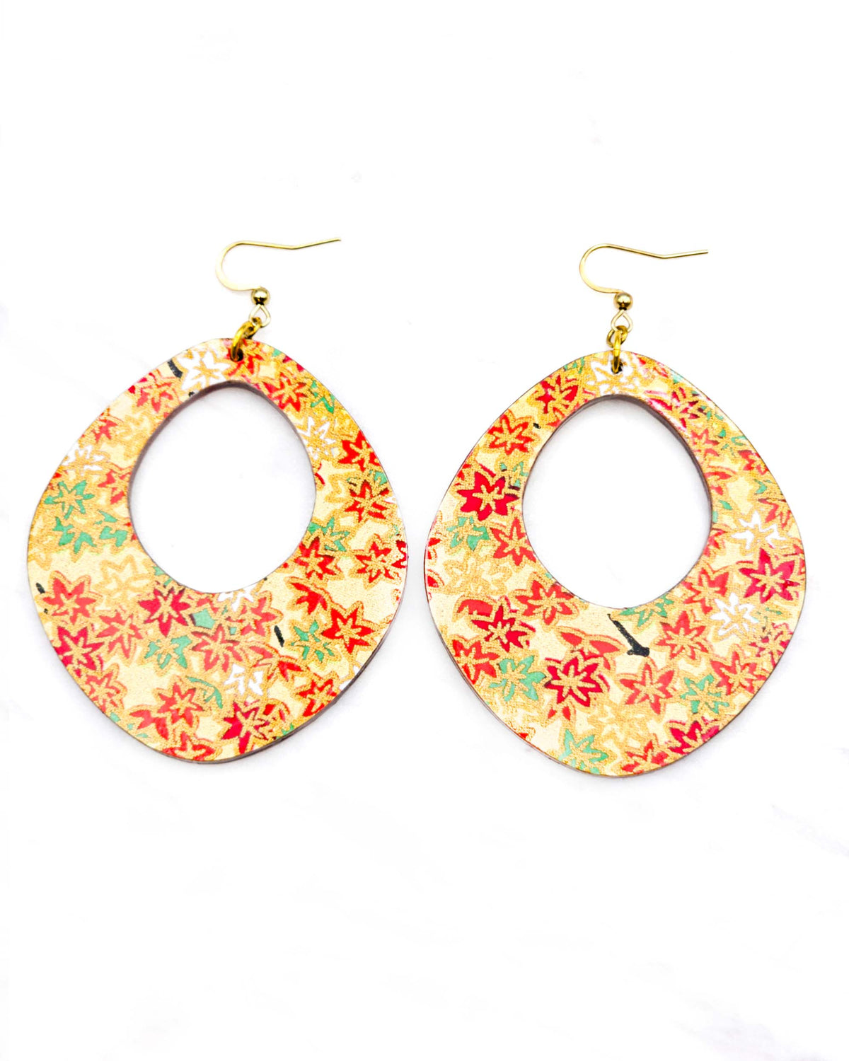 X-Large wooden abstract hoop shaped earrings featuring small red, green, and white momiji (maple leaves) on a gold background with metallic gold details.