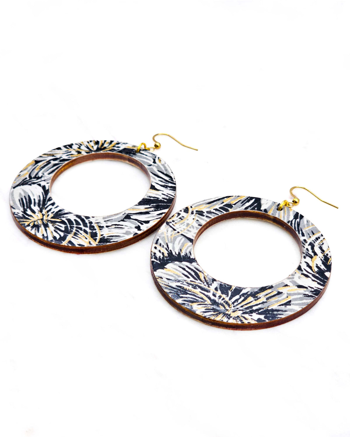 X-Large wooden round hoop shaped earrings featuring large black and gray chrysanthemums on a black background with metallic gold details.