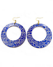 X-Large wooden round hoop shaped earrings featuring metallic gold water ripples on a dark blue background.