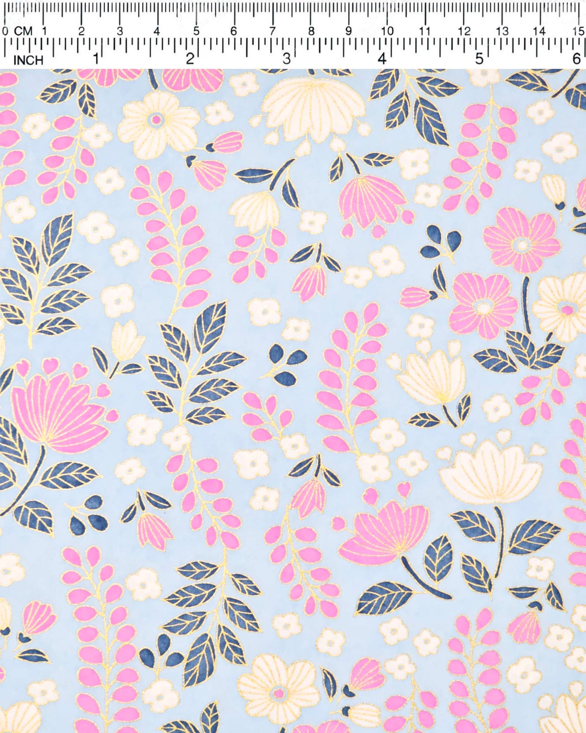 Japanese chiyogami paper featuring pink and white flowers with blue leaves and pink wisteria on a light blue background with metallic gold details.