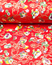 Japanese chiyogami paper featuring assorted white, purple, green, and yellow dragons on a red background with metallic gold details.