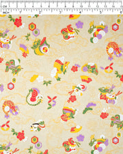 Japanese chiyogami paper featuring assorted white, purple, green, red, and yellow dragons on a gold background with metallic gold details.