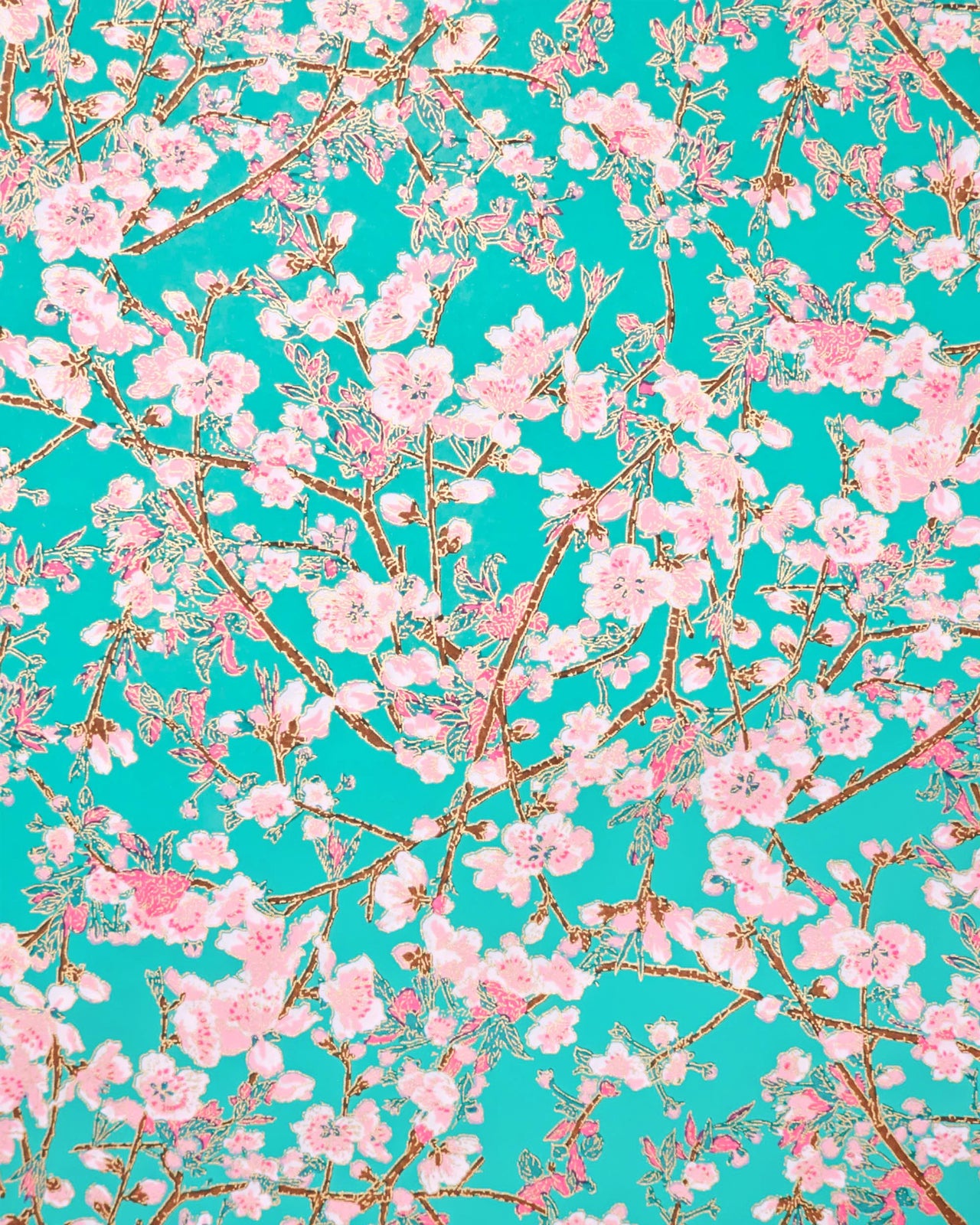 Japanese chiyogami paper featuring pink and white detailed plum blossoms with brown branches and green leaves on a turquoise background with metallic gold details.