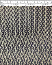 Japanese chiyogami paper featuring a metallic gold traditional Japanese sayagata design on a black background.