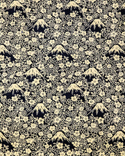 Japanese chiyogami paper featuring metallic gold Mt Fuji and cherry blossoms on a black background.