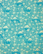 Japanese chiyogami paper featuring metallic gold Mt Fuji and cherry blossoms on a teal blue background.